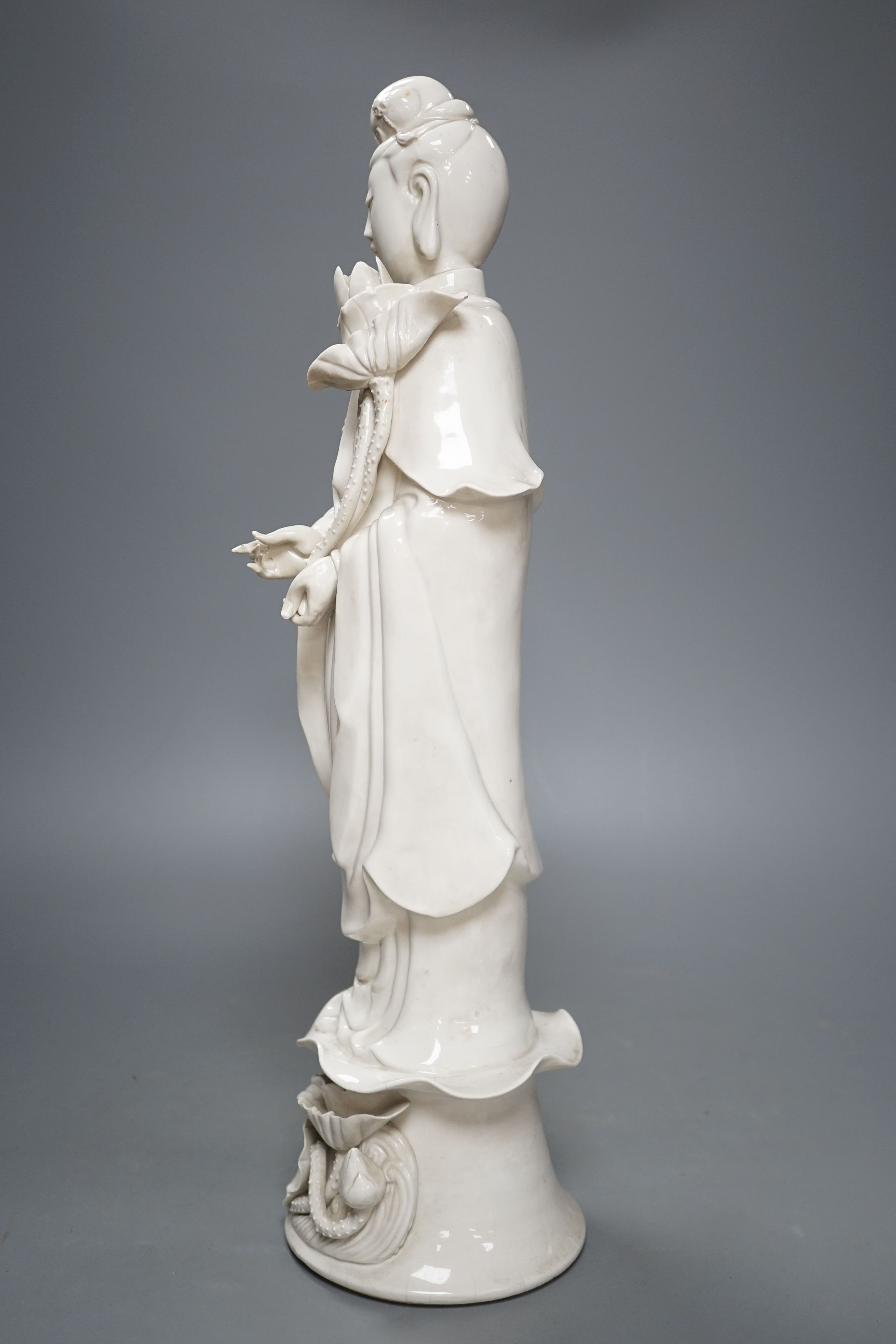 A tall Chinese blanc de chine figure of Guanyin -47cm high
